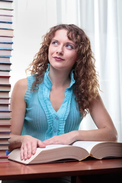 Young student woman with lots of books. — Stock Photo, Image