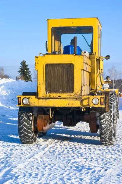 Big tractor on snow — Stock Photo, Image