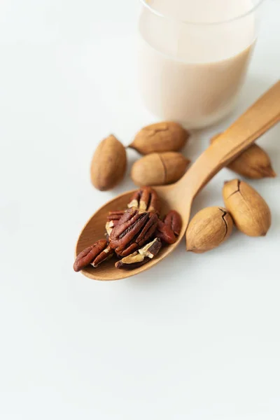 Vegan Pecan Milk Glass Cup Whole Nuts White Table Nuts — Stock Photo, Image