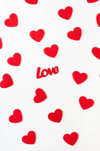 Pozadí Které Skládá Červených Srdcí Nápis Láska Uprostřed Srdcí Svislá — Stock fotografie