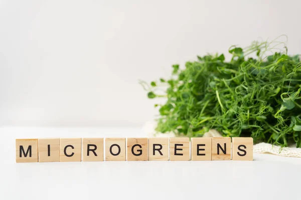 Vegetable Pea Sprouts Microgreens White Background Vegan Health Superfood Inscription — Stock Photo, Image