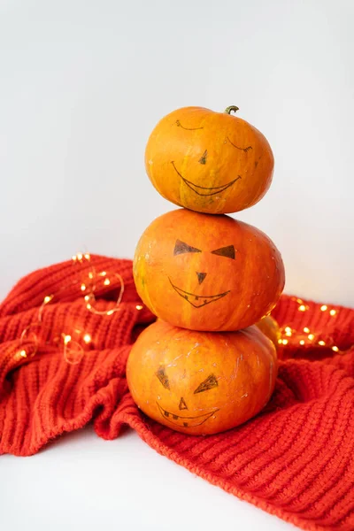 Three Pumpkins Painted Face Red Sweater Concept Holiday October Halloween — Stockfoto