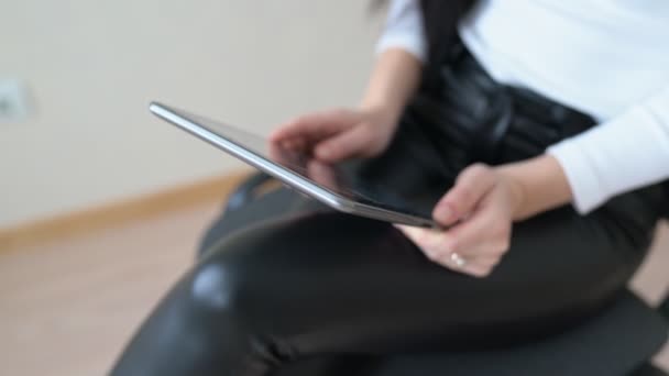 Woman Leather Pants Relaxing Home Sit Holding Digital Tablet Hands — Stockvideo
