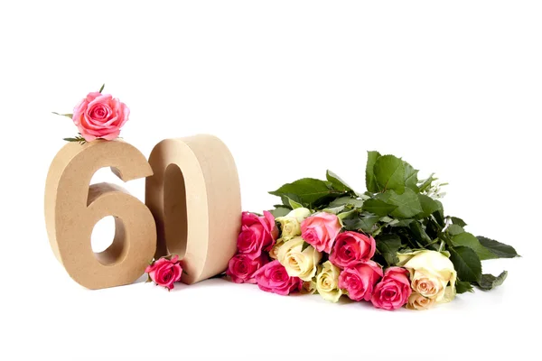 Edad en cifras sobre un lecho de rosas — Foto de Stock