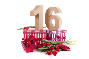 bir parti havası kırmızı lale bir yatak üzerinde rakamlar çağında