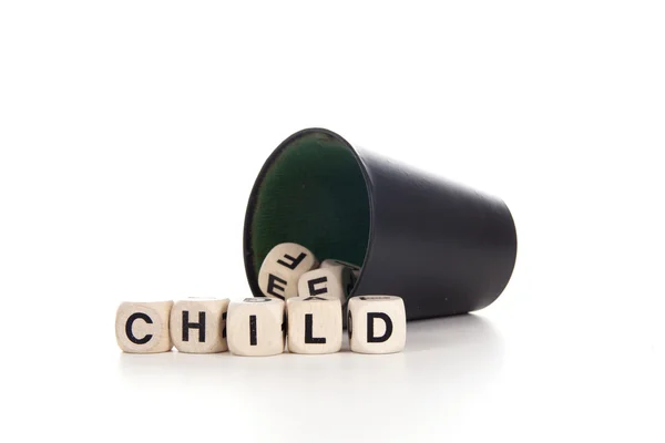 Criança em dices — Fotografia de Stock