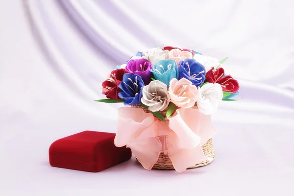 Flowers and velvet box — Stock Photo, Image