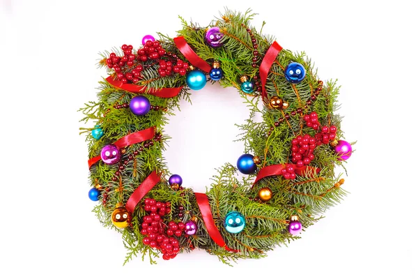 Green christmas wreath with decorations Stock Photo