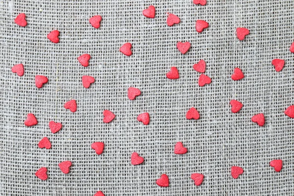 Linen canvas with little red hearts — Stock Photo, Image