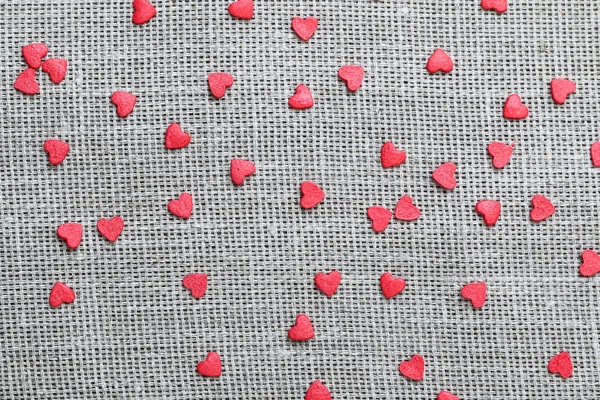 Linen canvas with little red hearts — Stock Photo, Image