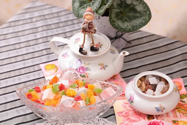 Warm cup of tea and sweets — Stock Photo, Image