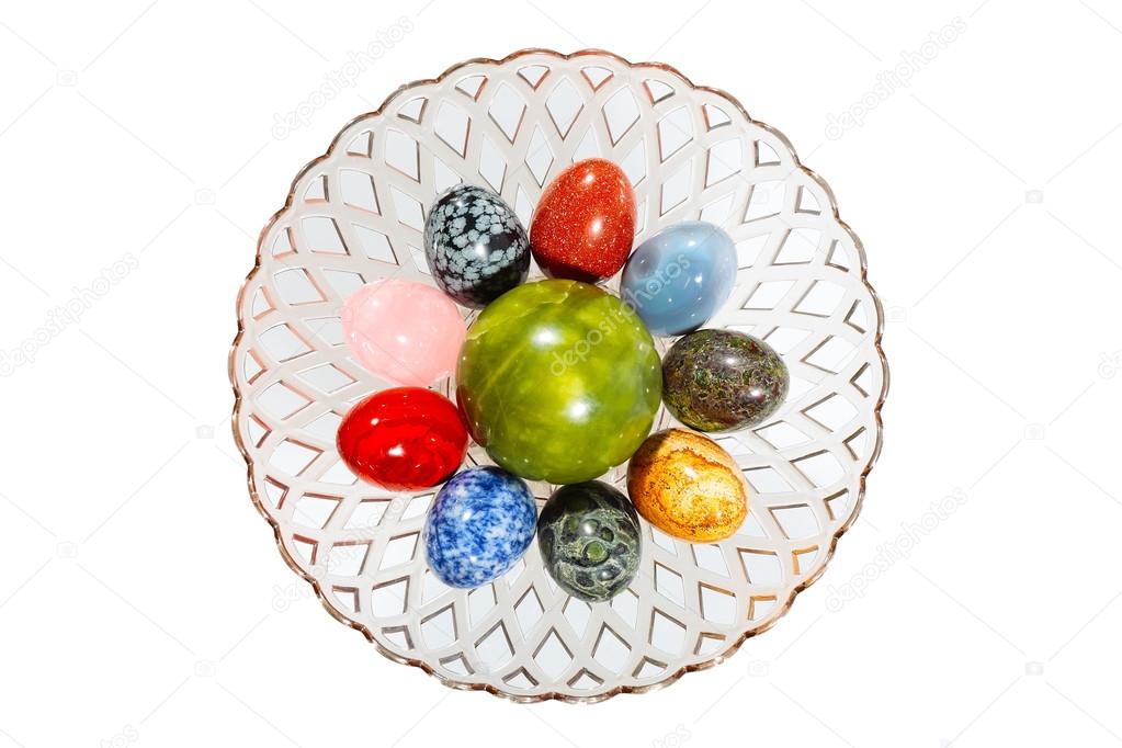 Various colorful stone eggs in the vase