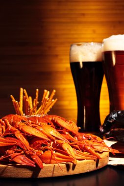 Dark and light beer with crawfish clipart