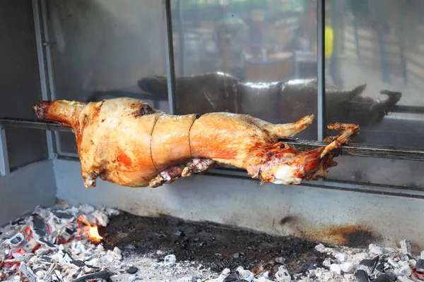 Roasted lamb on the spit — Stock Photo, Image