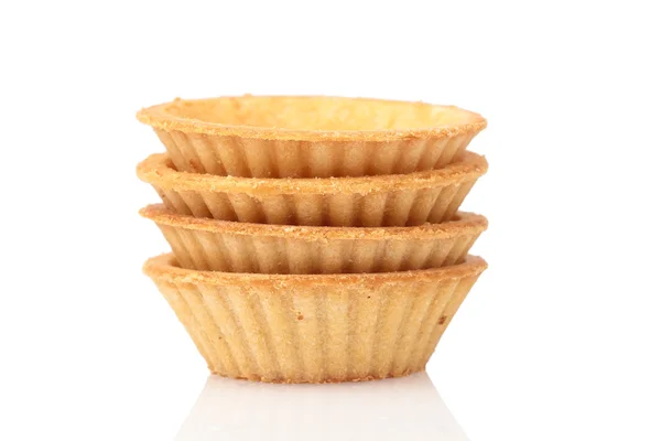 Stapel leeg tartlets op wit — Stockfoto