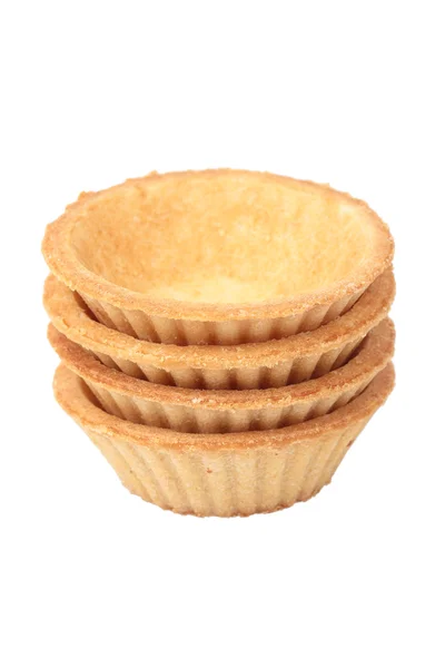 Stack of empty tartlets on white — Stock Photo, Image