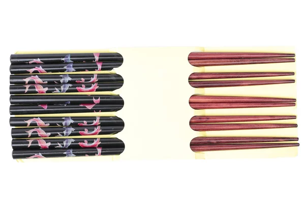 Set of dark wood chopsticks on white — Stock Photo, Image