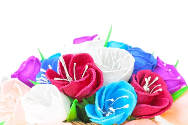 Beautiful paper flowers in basket — Stock Photo, Image