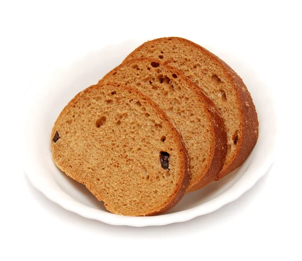 Sneetjes brood liggend op een plaat — Stockfoto