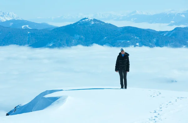 Woman on winter mountain top — Stock Photo, Image