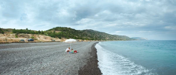 Family on summer beach in Crimea, Ukraine. — Stock Photo, Image