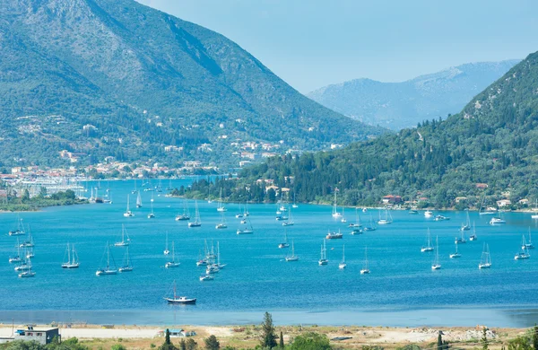 Many sailing vessels in bay (Nydri, Lefkada, Greece) — Stock Photo, Image