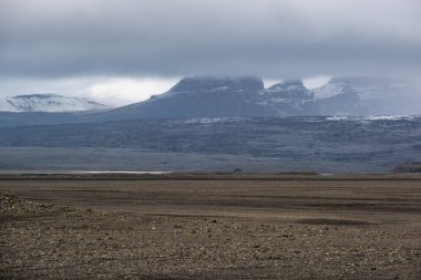 Iceland autumn tundra landscape near Haoldukvisl glacier, Iceland. Glacier tongue slides from the Vatnajokull icecap or Vatna Glacier near subglacial Esjufjoll volcano. Not far from Iceland Ring Road.