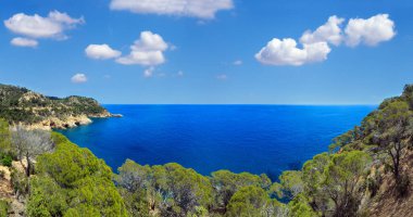 Summer sea rocky coast landscape, Costa Brava, Spain. View from above.  Three shots stitch high-resolution panorama.