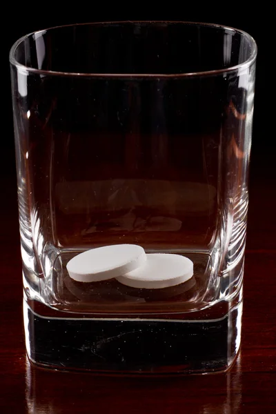 Pills in a glass — Stock Photo, Image