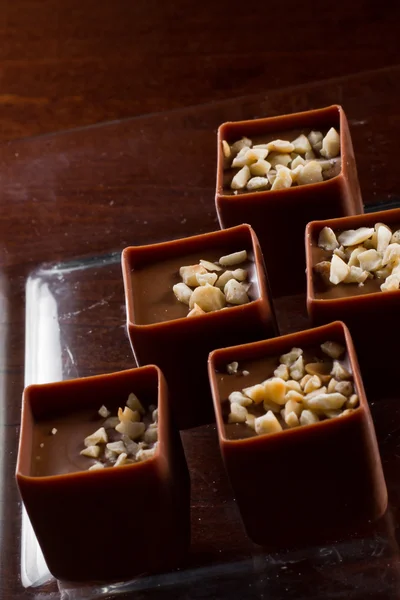 Peanuts and chocolates — Stock Photo, Image