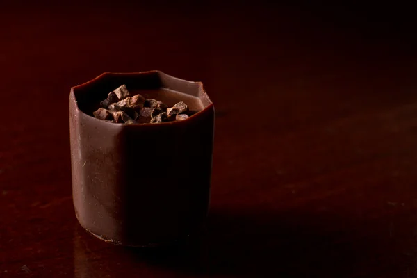 Bijten grootte chocolade — Stockfoto
