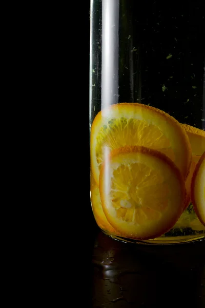 Orange infused vodka — Stock Photo, Image