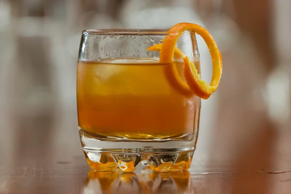 Orange liquor on the rocks — Stock Photo, Image