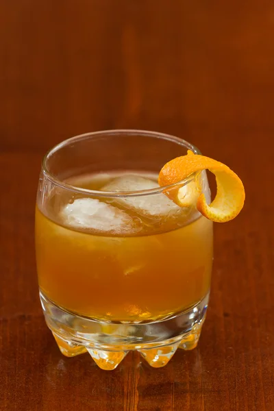 Orange liquor on the rocks — Stock Photo, Image