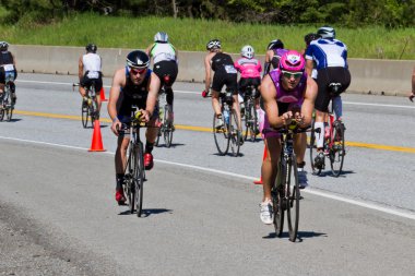 Jared Woodford in the Coeur d' Alene Ironman cycling event clipart