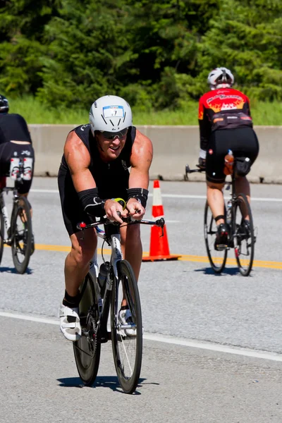 Ben Cotter in the Coeur d 'Alene Ironman cycling event — стоковое фото