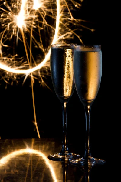 Champagner und Feuerwerk — Stockfoto