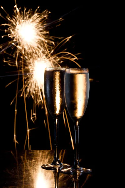 Champagne and fireworks — Stock Photo, Image