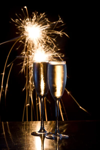 Champagne and fireworks — Stock Photo, Image