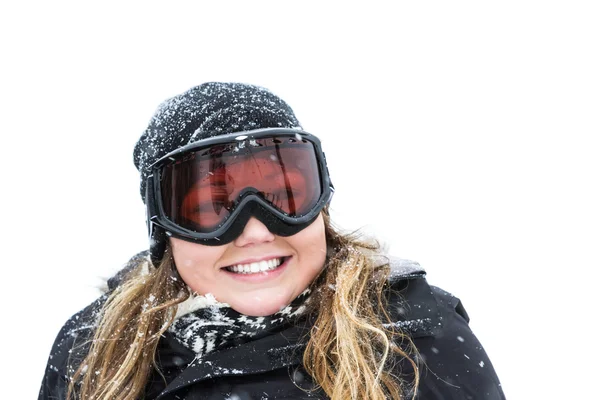 Jonge vrouw in de sneeuw — Stockfoto