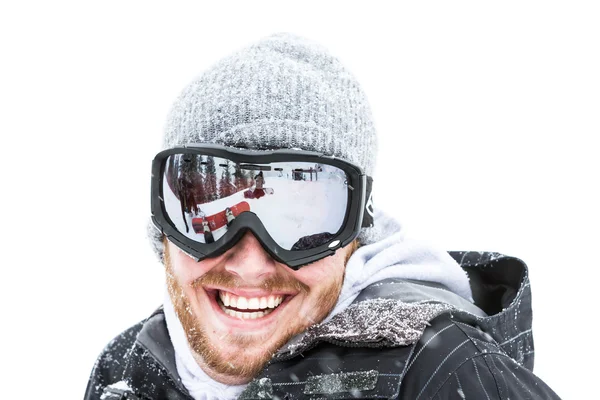 Щасливий чоловік у сніговому спорядженні — стокове фото