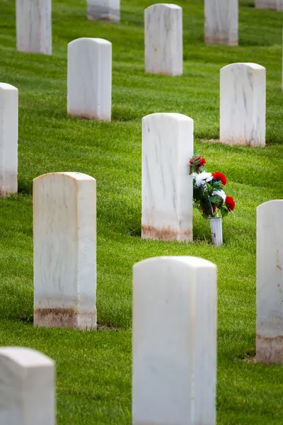 Flowers in a military graveyard — Stock Photo, Image