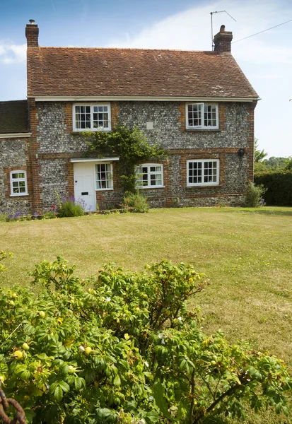 Cottage and lawn — Stock Photo, Image