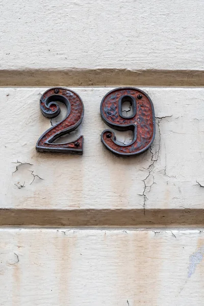 Number Twenty Nine White Painted Plaster Wall — Fotografia de Stock