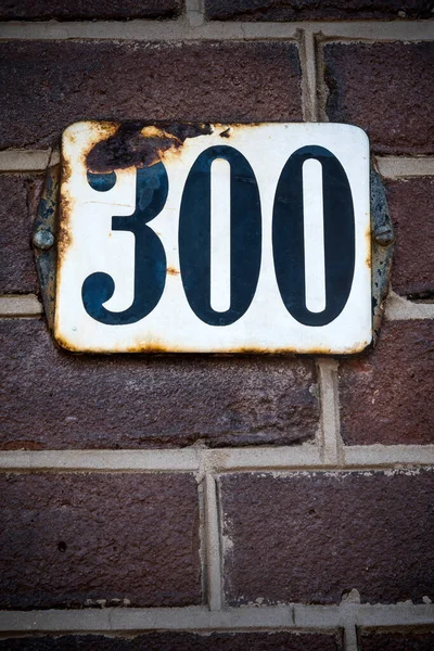 Number Three Hundred Sign Brick Wall — Stockfoto