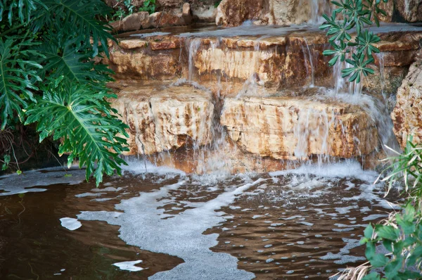 Beautiful waterfall in the garden . — Stock Photo, Image