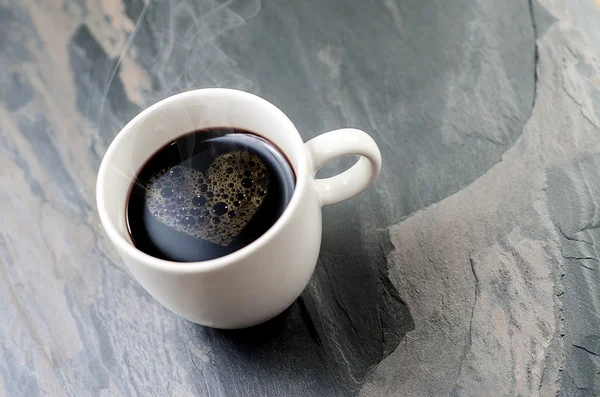 Šálek na kávu s symbol srdce — Stock fotografie