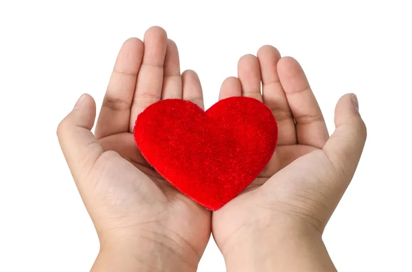 Rött hjärta i händerna på vit bakgrund, urklippsbana — Stockfoto