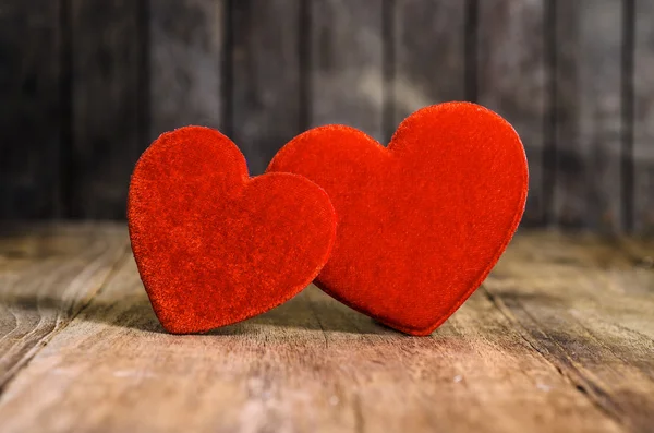 Two Red on wood background — Stock Photo, Image