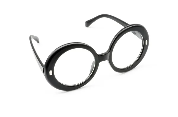 Närbild på glasögon på en vit bakgrund med skuggor — Stockfoto